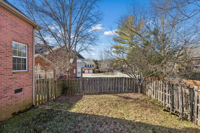 a view of a wooden fence