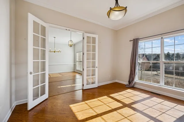 a view of an empty room with a window