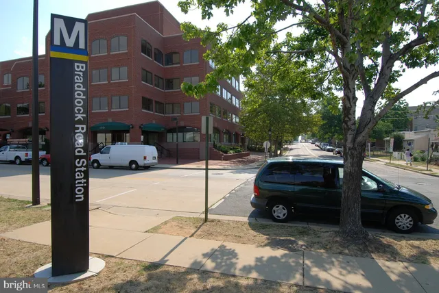 a view of a car parked in front of a building