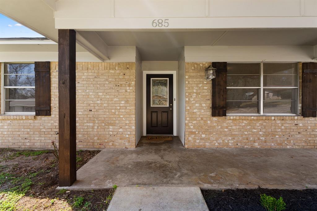 685 Sides Circle Canton, TX 75103 - Photo 2 of 32 a front view of a house with a large window