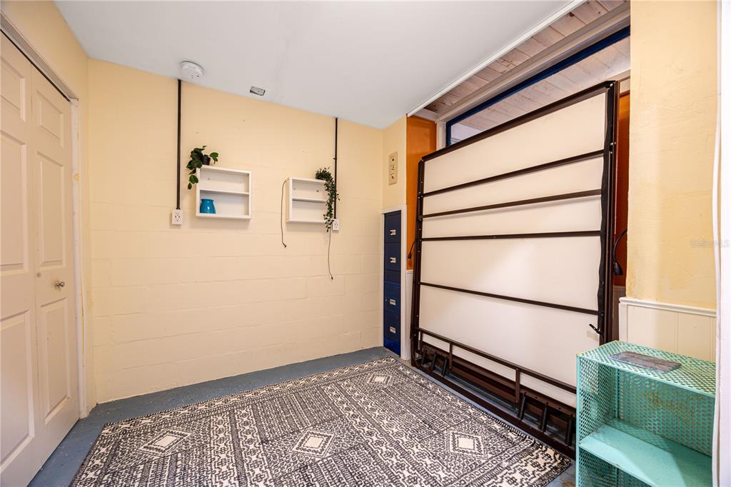 7 55th Street Yankeetown, FL 34498 - Photo 18 of 100 a view of a closet area with wooden floor