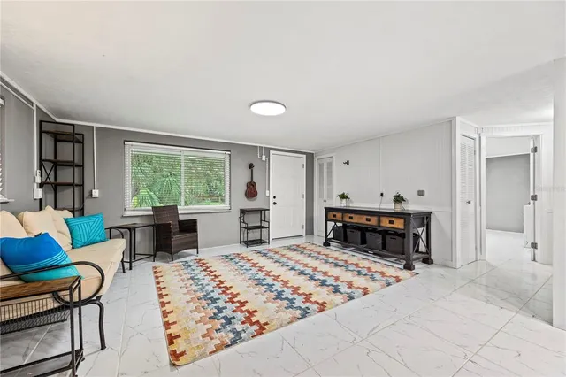 a kitchen with a refrigerator and a sink