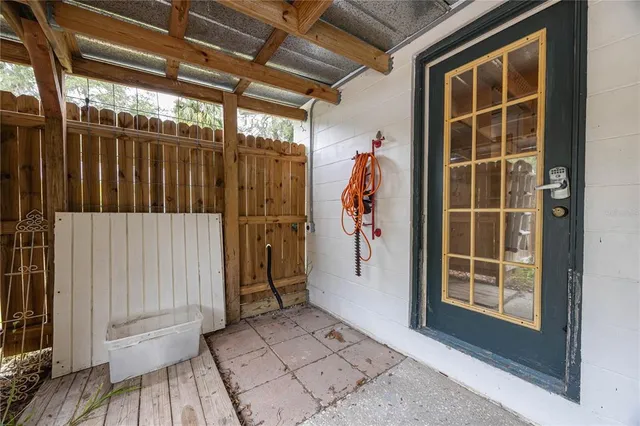 a view of a backyard of the house