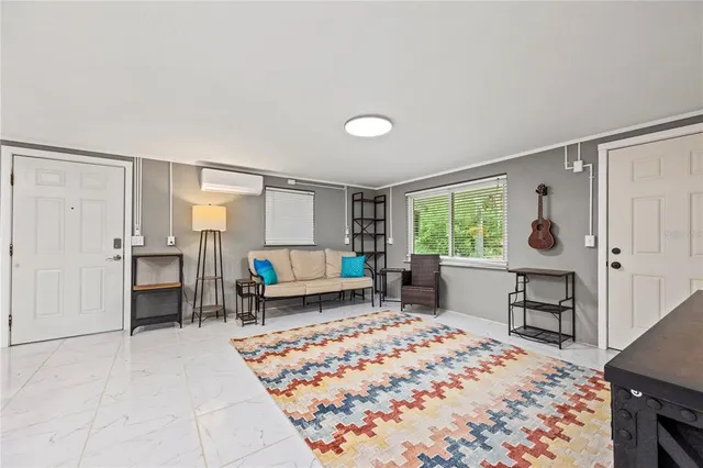 a kitchen with a stove a sink and a microwave