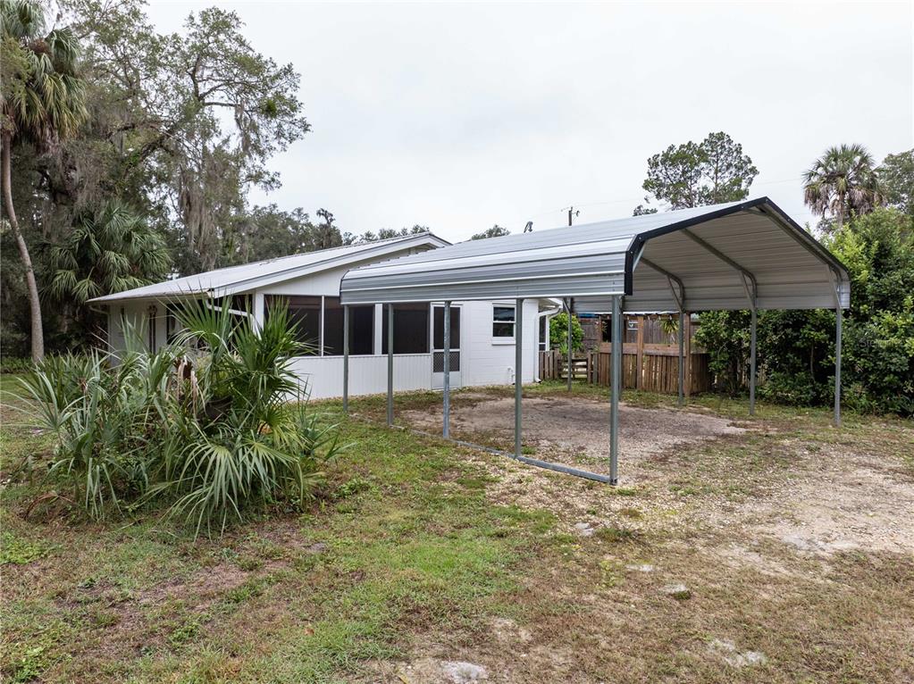 7 55th Street Yankeetown, FL 34498 - Photo 32 of 100 a view of a house with a backyard