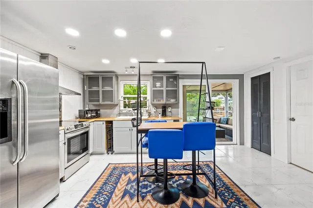 a view of a storage & utility room with a window