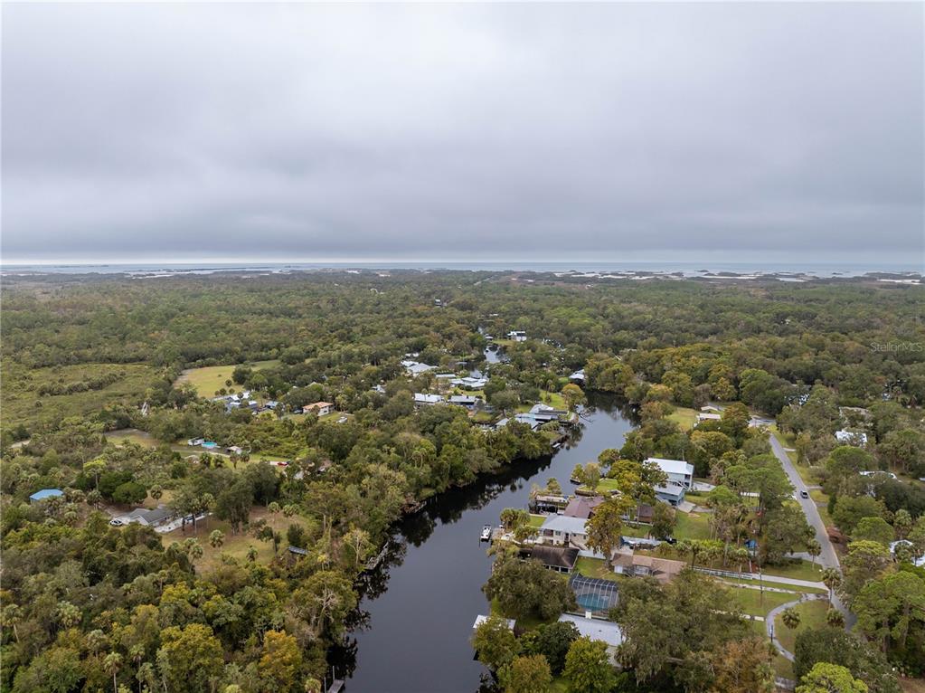 7 55th Street Yankeetown, FL 34498 - Photo 49 of 100 an aerial view of residential house and lake view
