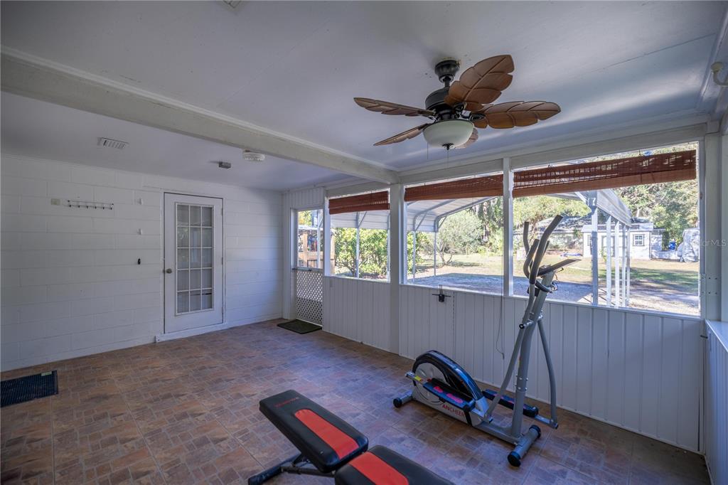 7 55th Street Yankeetown, FL 34498 - Photo 78 of 100 a room with gym equipment and a large window