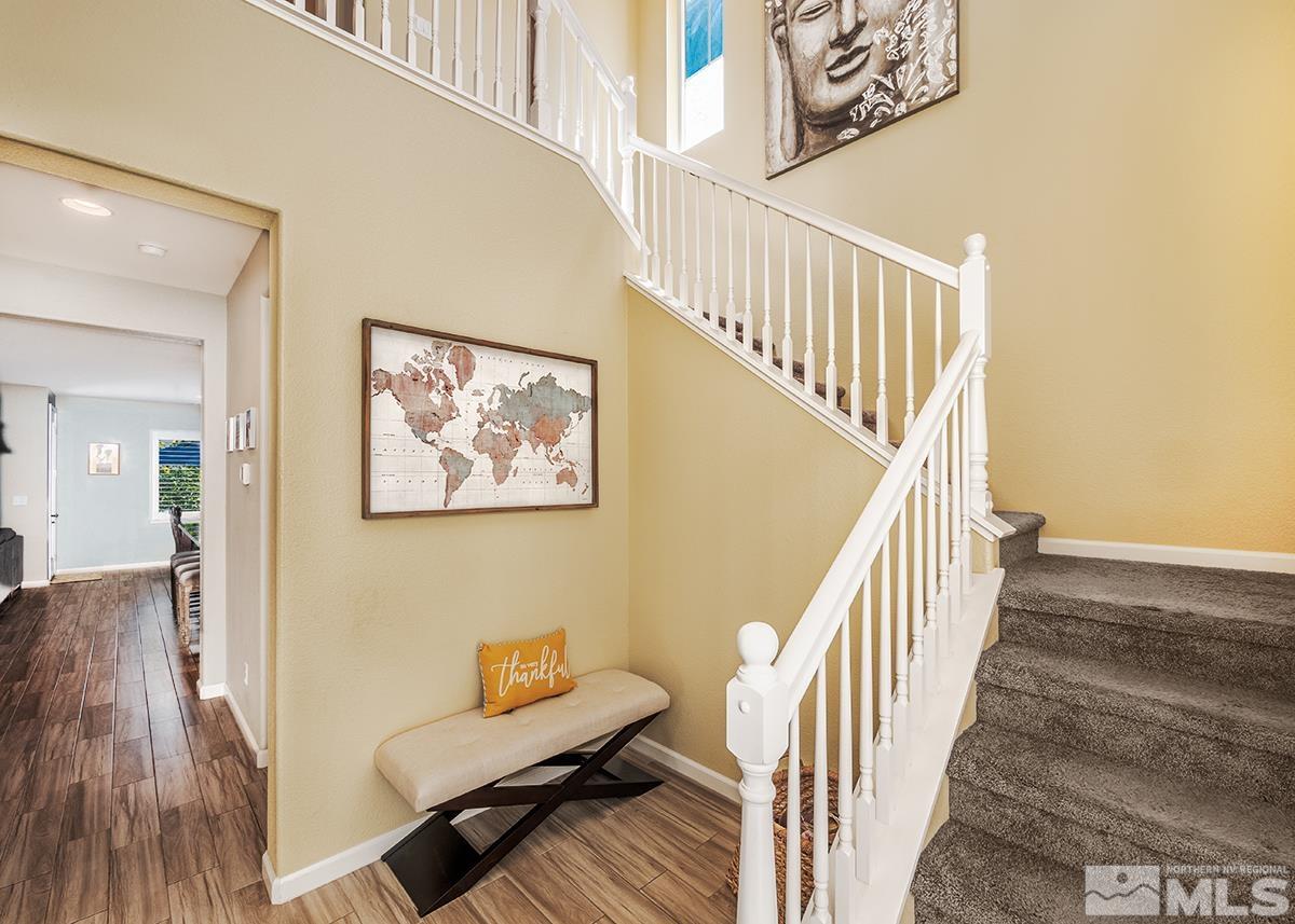 1990 Hope Valley Drive Reno, NV 89521 - Photo 2 of 22 a view of staircase with wooden floor and a rug