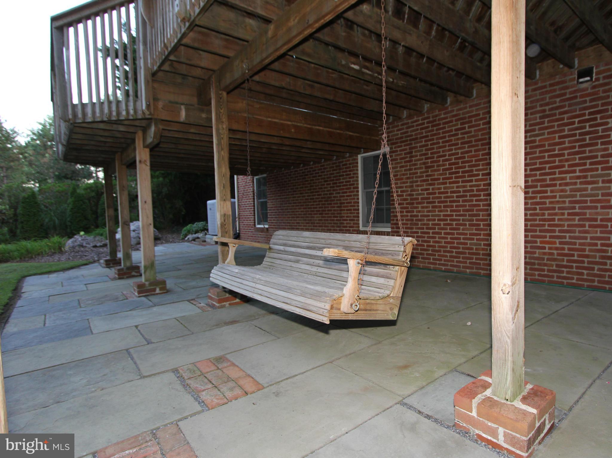 8129 Stone Ridge Drive Frederick, MD 21702 - Photo 23 of 30 Private Slate Patio With Swing.