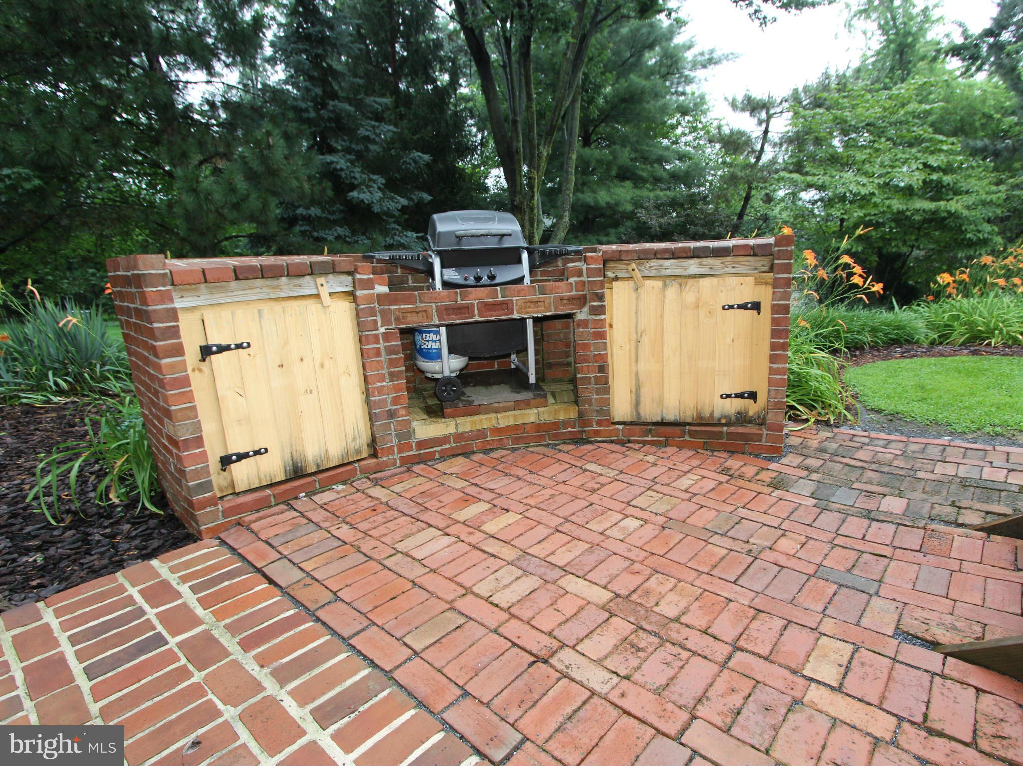 8129 Stone Ridge Drive Frederick, MD 21702 - Photo 25 of 30 Brick Patio With Outdoor Kitchen.