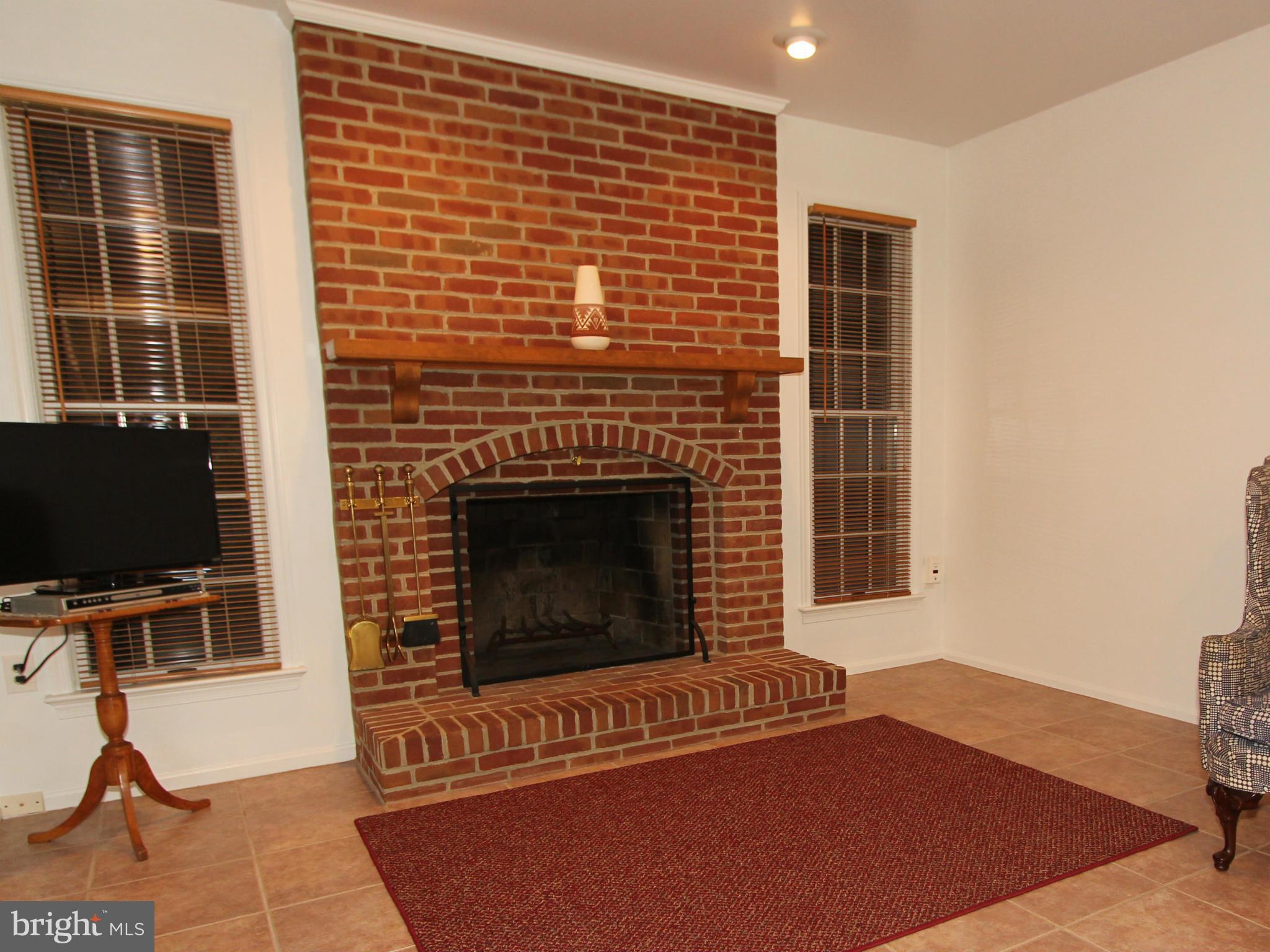 8129 Stone Ridge Drive Frederick, MD 21702 - Photo 5 of 30 Family Room With Brick Fireplace.