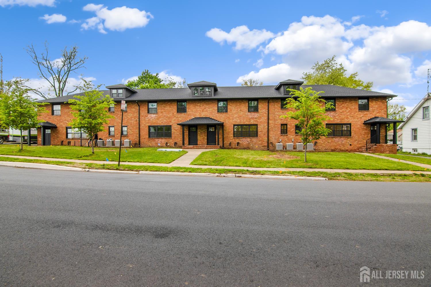 4 Morris Avenue, Unit 2A Edison, NJ 08837 - Photo 2 of 27 a view of a volley ball court