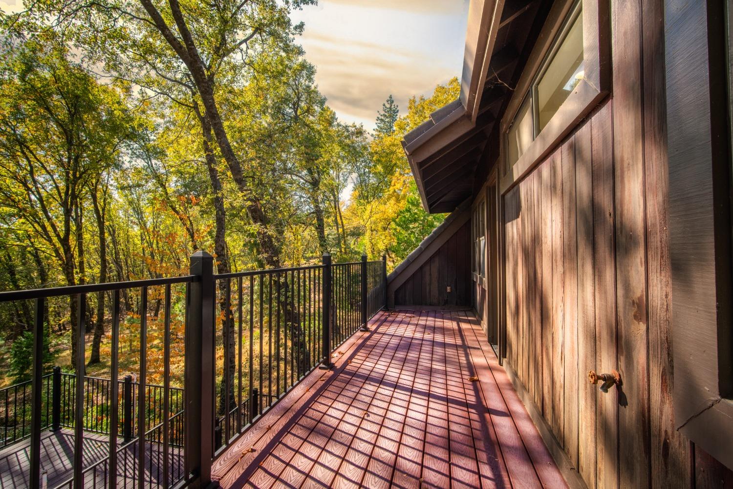 3961 7 Ridges Road Camino, CA 95709 - Photo 48 of 86 a view of balcony with wooden floor and fence