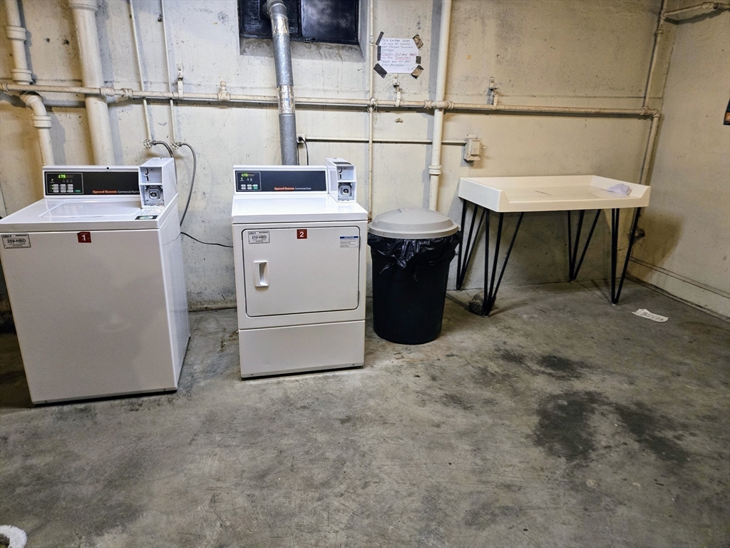 465 Arborway, Unit 13 Boston, MA 02130 - Photo 37 of 41 a utility room with dryer and washer