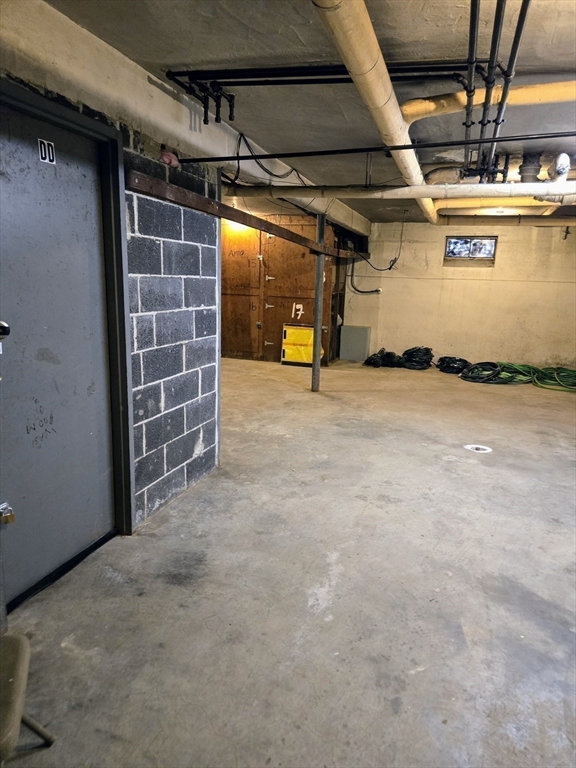 465 Arborway, Unit 13 Boston, MA 02130 - Photo 39 of 41 a view of a garage