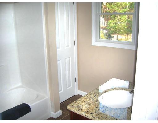 9 Cypress Road Groton, MA 01450 - Photo 11 of 13 a bathroom with a toilet