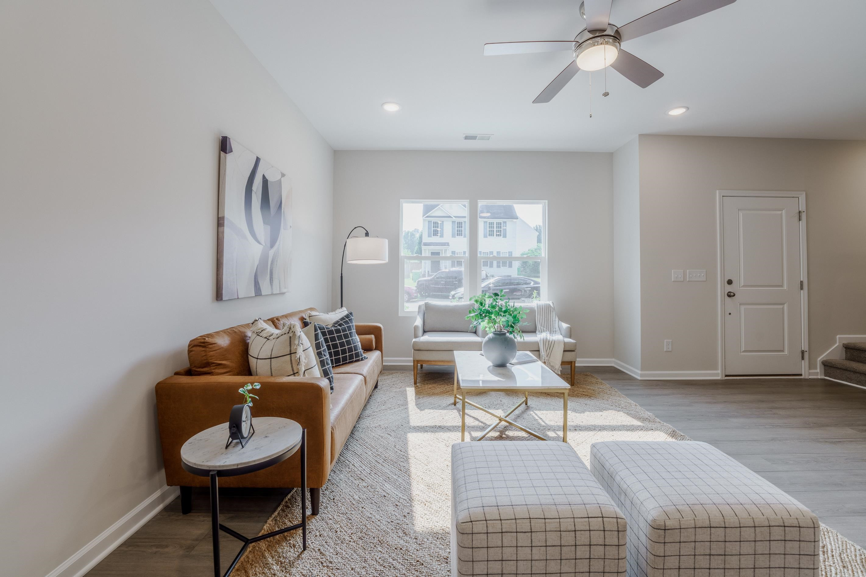 1309 Swingline Way Raleigh, NC 27610 - Photo 23 of 47 a living room with furniture and a large window