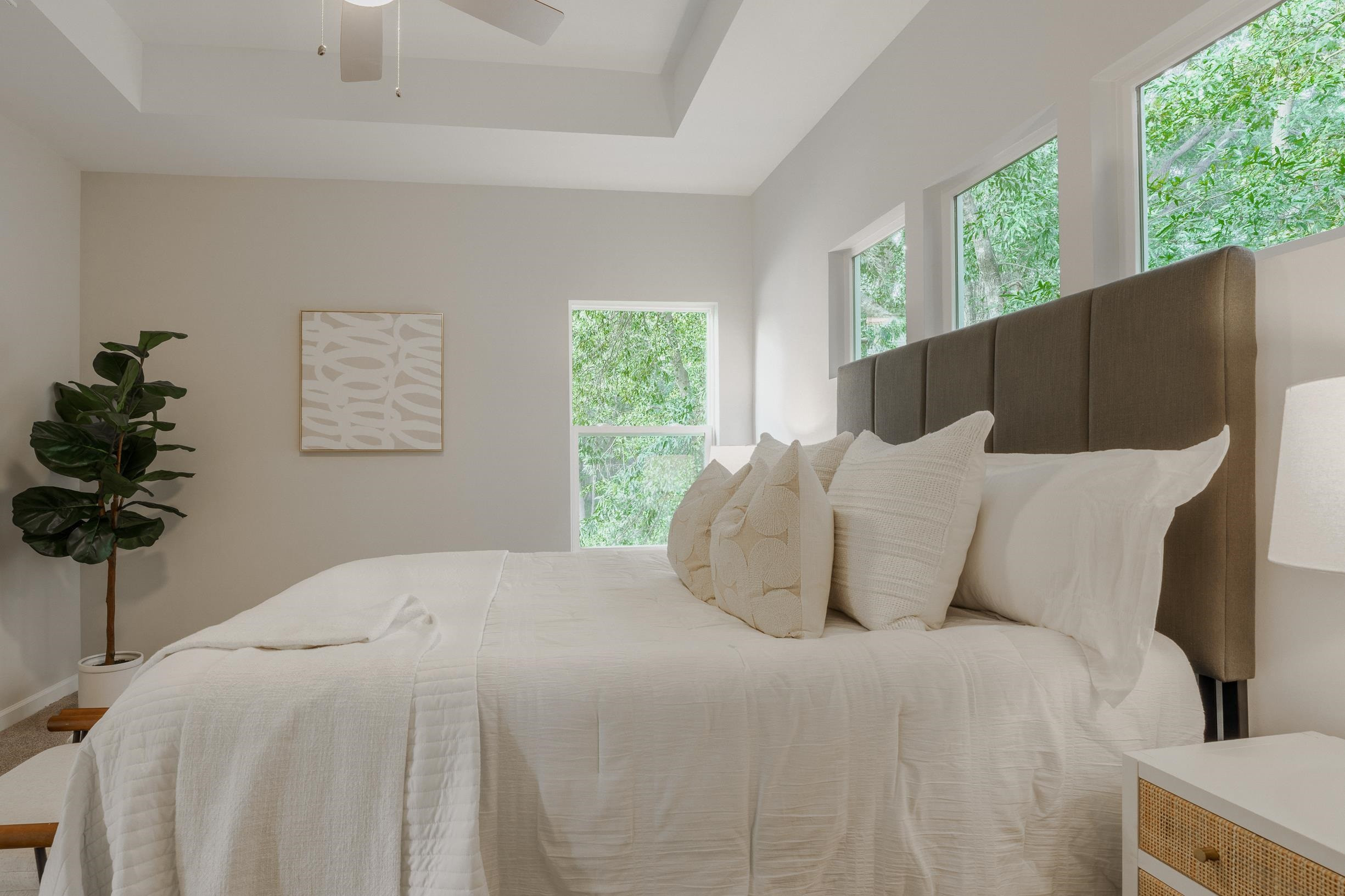 1309 Swingline Way Raleigh, NC 27610 - Photo 31 of 47 a bedroom with a large bed and a potted plant