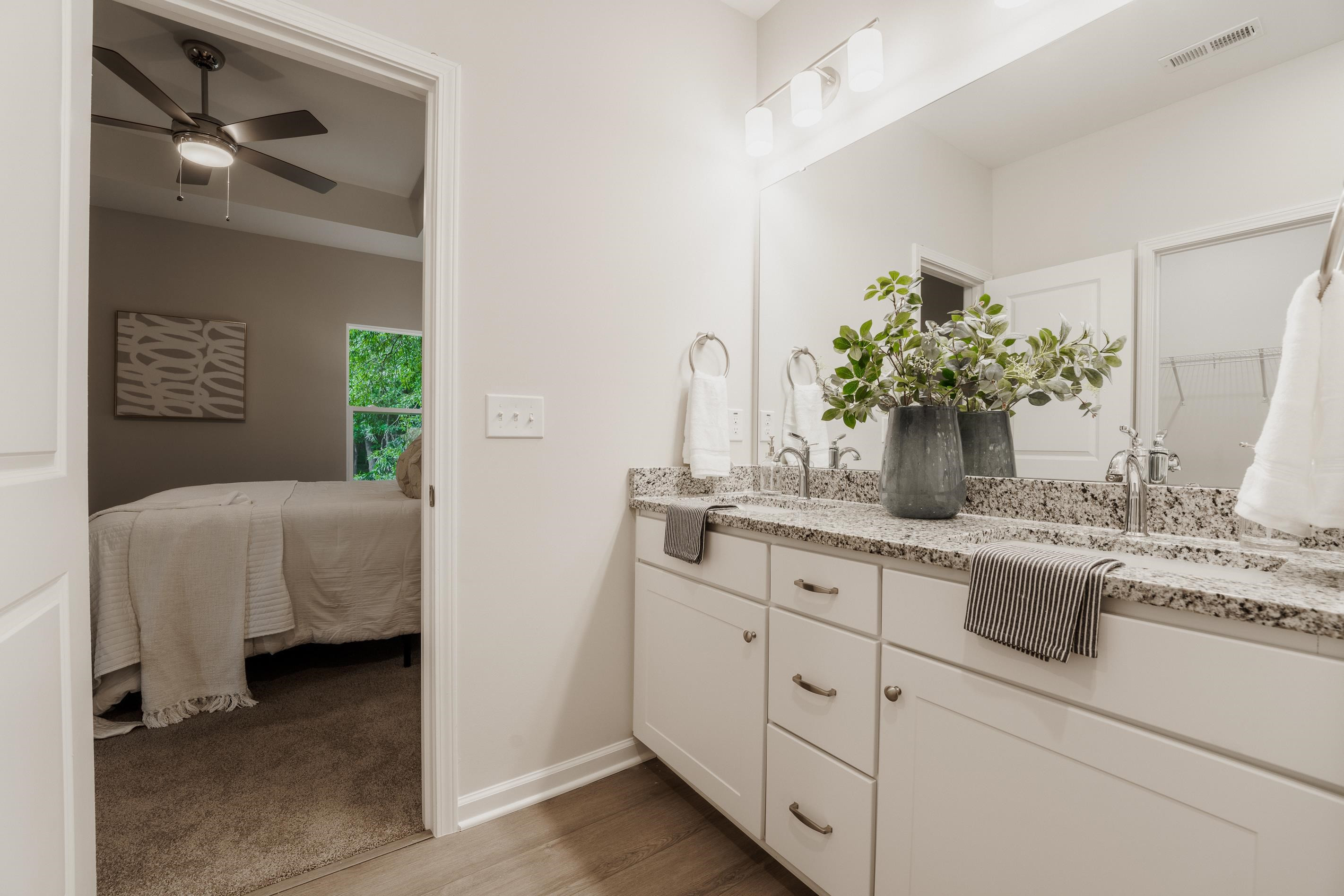 1309 Swingline Way Raleigh, NC 27610 - Photo 34 of 47 a bathroom with a sink and a mirror