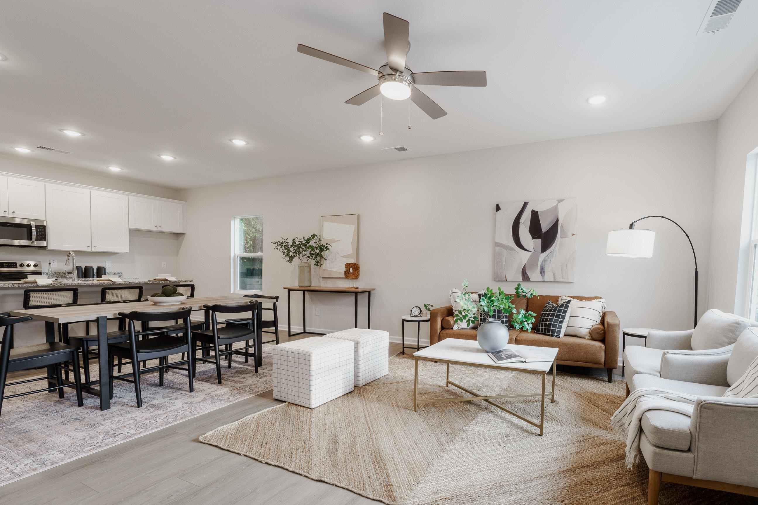 1309 Swingline Way Raleigh, NC 27610 - Photo 4 of 47 a living room with furniture and view of kitchen