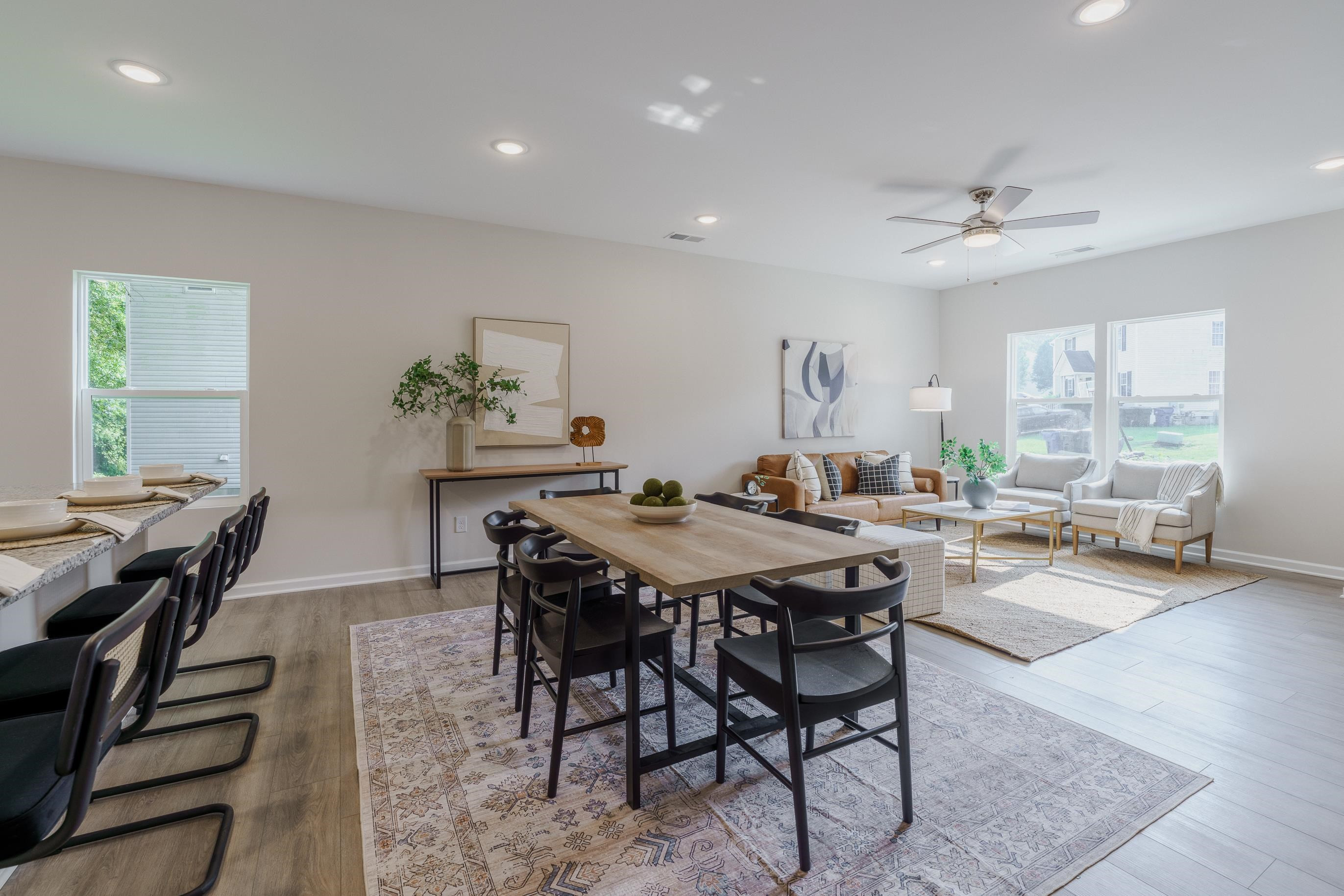 1309 Swingline Way Raleigh, NC 27610 - Photo 8 of 47 a view of a dining room with furniture window and wooden floor