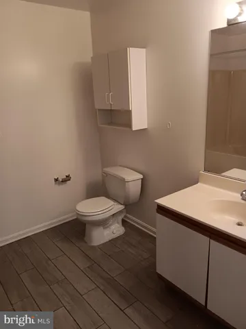 a bathroom with a shower and a shower head
