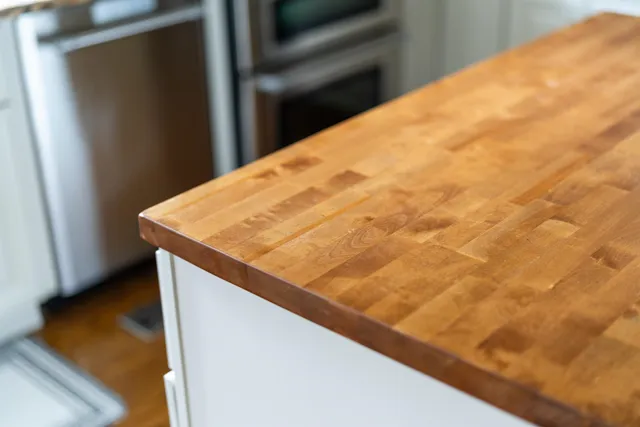 a view of workspace with wooden floor and window