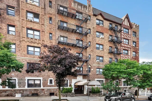 a utility room with dryer washer and other items