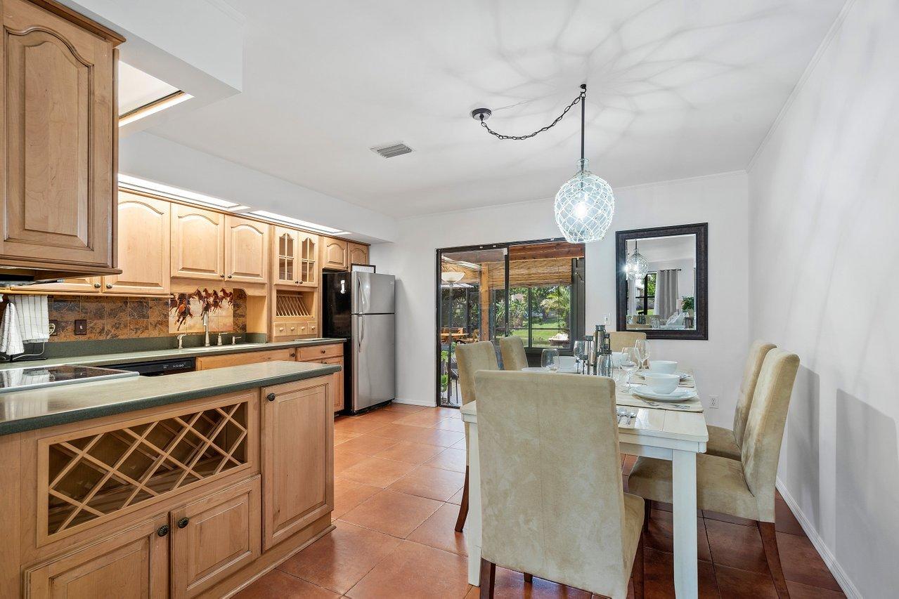 1369 Riverside Circle Wellington, FL 33414 - Photo 18 of 47 Dining room and kitchen