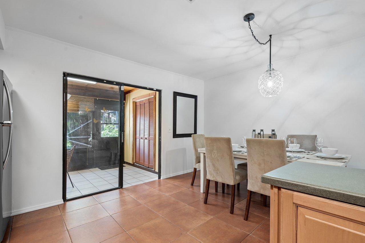 1369 Riverside Circle Wellington, FL 33414 - Photo 24 of 47 Access to air conditioned patio