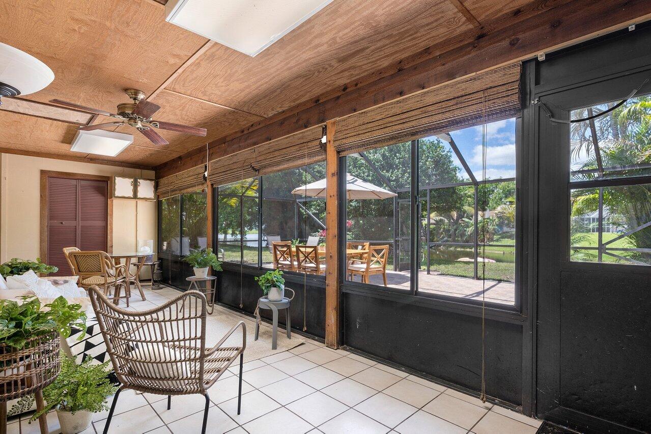 1369 Riverside Circle Wellington, FL 33414 - Photo 25 of 47 Air conditioned patio with water views