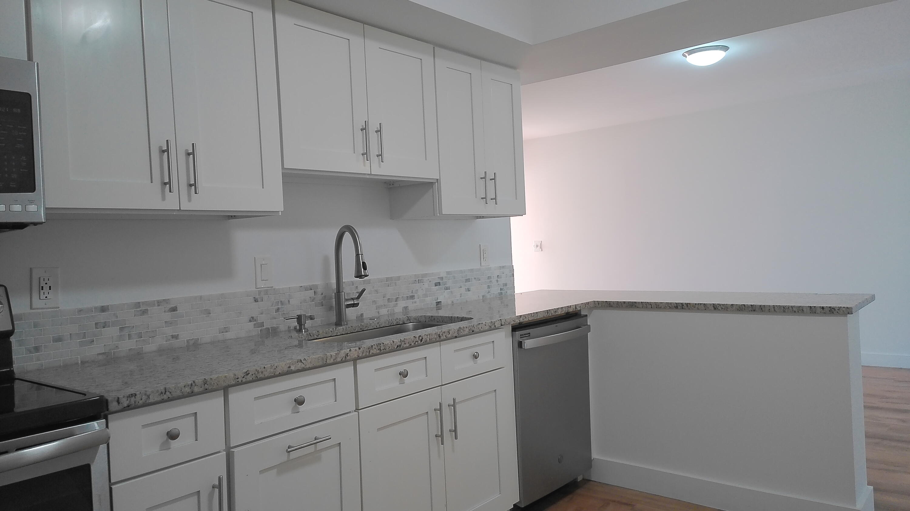 3180 Leewood Terrace, Unit L108 Boca Raton, FL 33431 - Photo 5 of 23 Kitchen