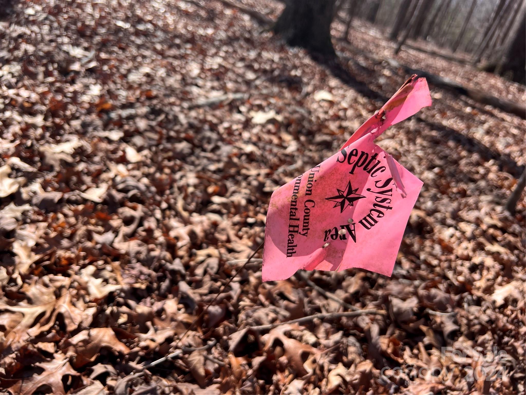 9602 Rollins Road Waxhaw, NC 28173 - Photo 10 of 12 a sign that is on a brick wall