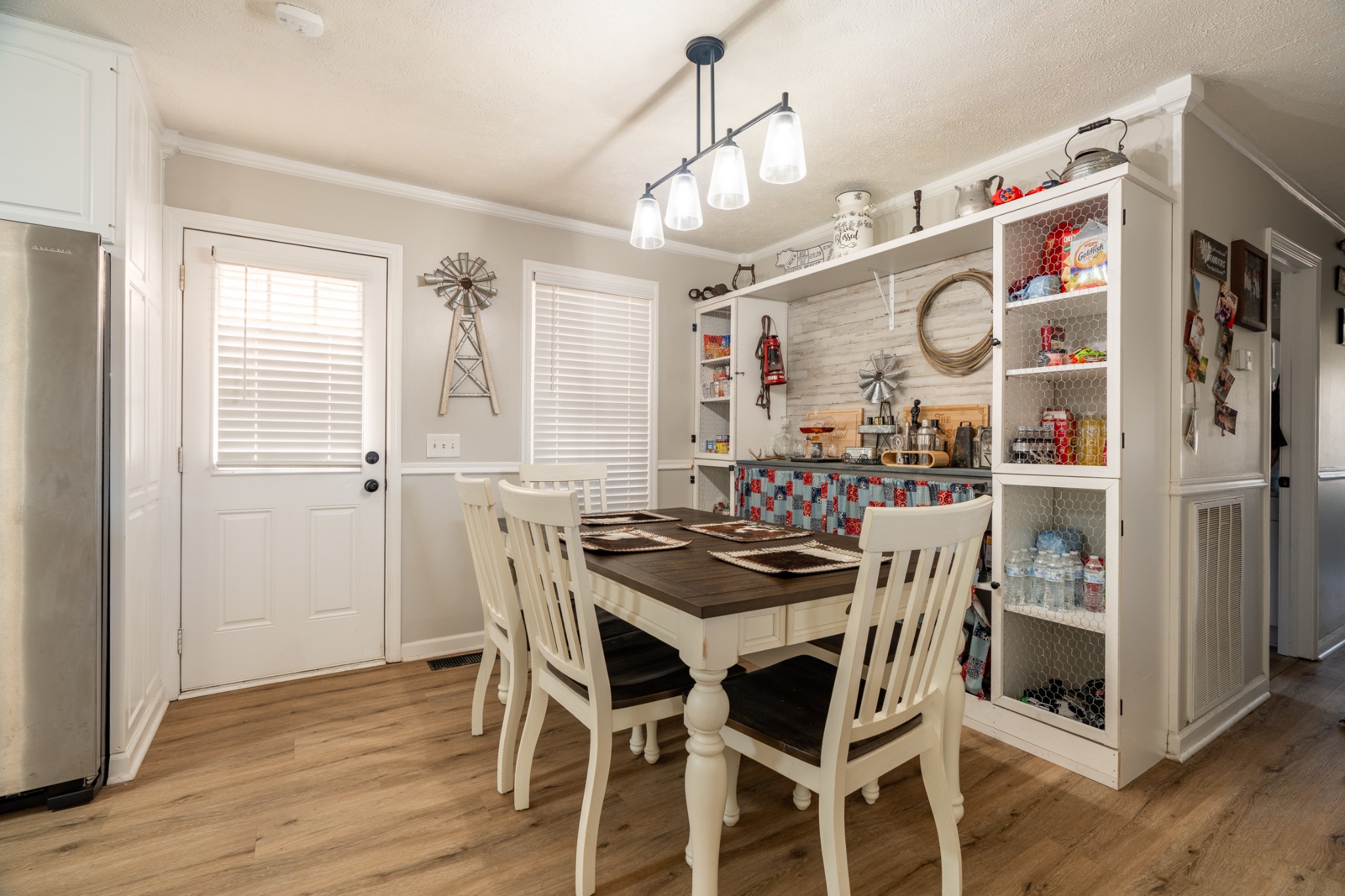 1727 Johnson Chapel Road Sparta, TN 38583 - Photo 8 of 30 a view of a dining room with furniture and wooden floor
