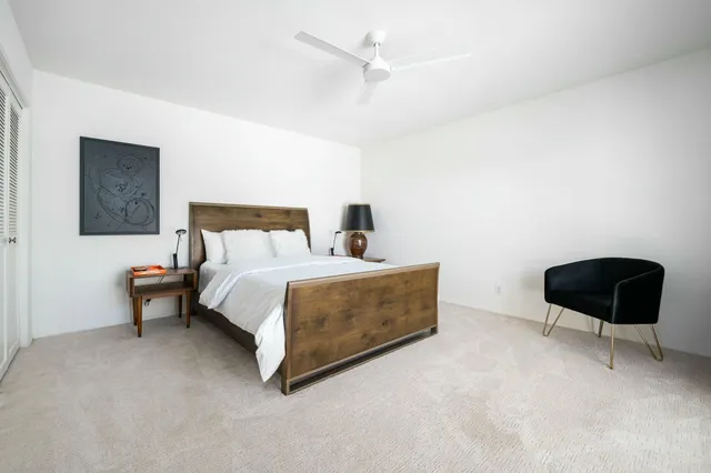 a view of a swimming pool and a yard