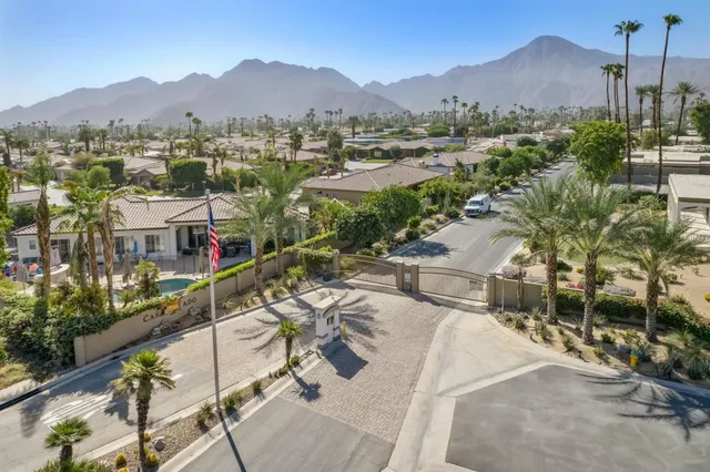 a view of a house with a swimming pool and outdoor space