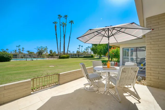 a view of a lake with building in front of it