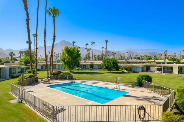 a view of table and chairs in patio