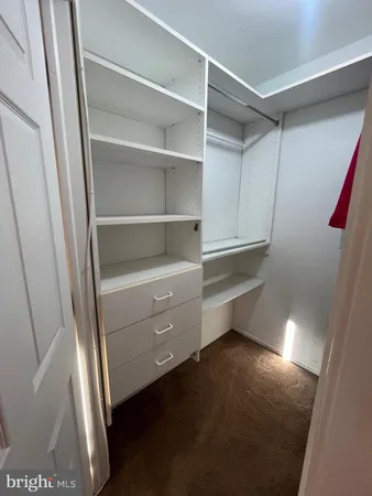 a room with storage and utility