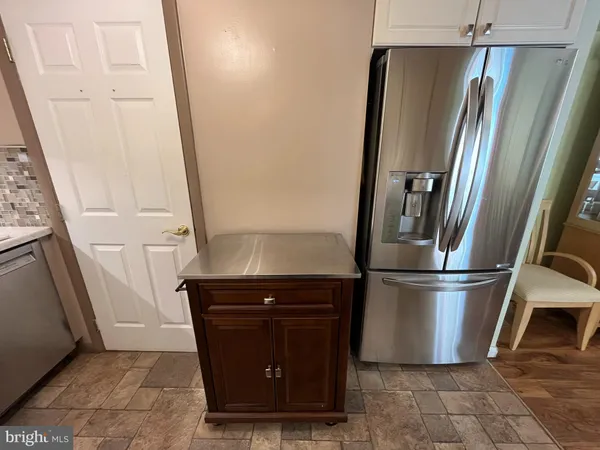 a view of a kitchen with a sink