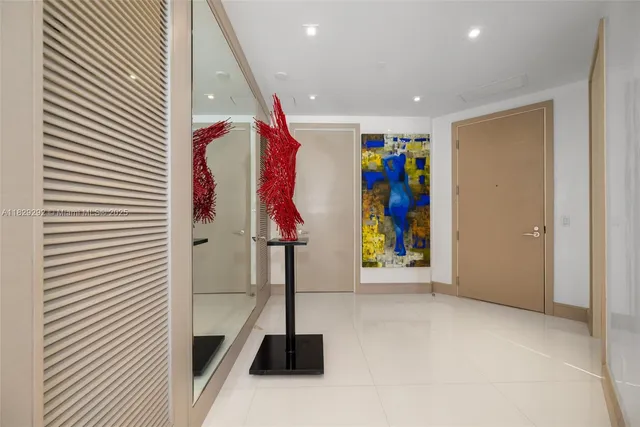 a bedroom with a bed and a night lamp