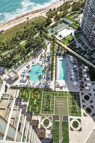 a view of a balcony with an ocean view