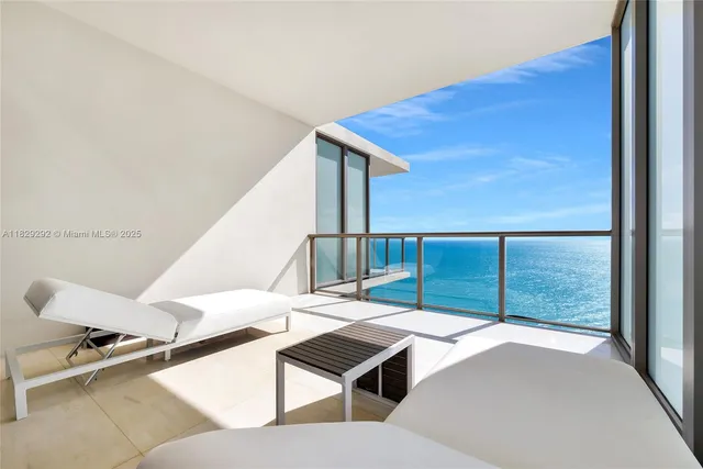 a bathroom with a bathtub and a sink