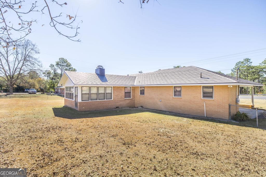 172 Old Eastman Road Cochran, GA 31014 - Photo 13 of 60 a view of a house with a yard