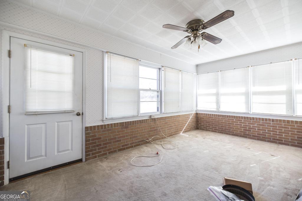 172 Old Eastman Road Cochran, GA 31014 - Photo 14 of 60 a view of an empty room with a window