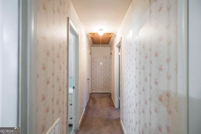 a kitchen with granite countertop a sink and a window