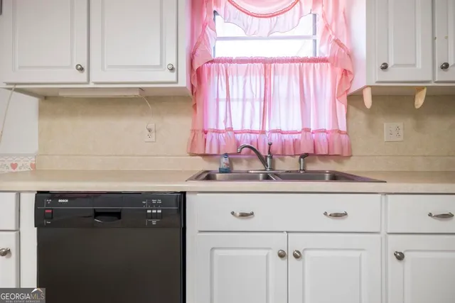 a house view with a sitting space and garden space