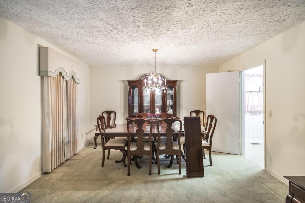 172 Old Eastman Road Cochran, GA 31014 - Photo 32 of 60 a view of a dining room with furniture and window