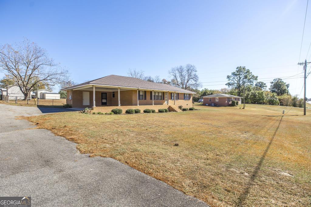 172 Old Eastman Road Cochran, GA 31014 - Photo 34 of 60 a view of house with yard